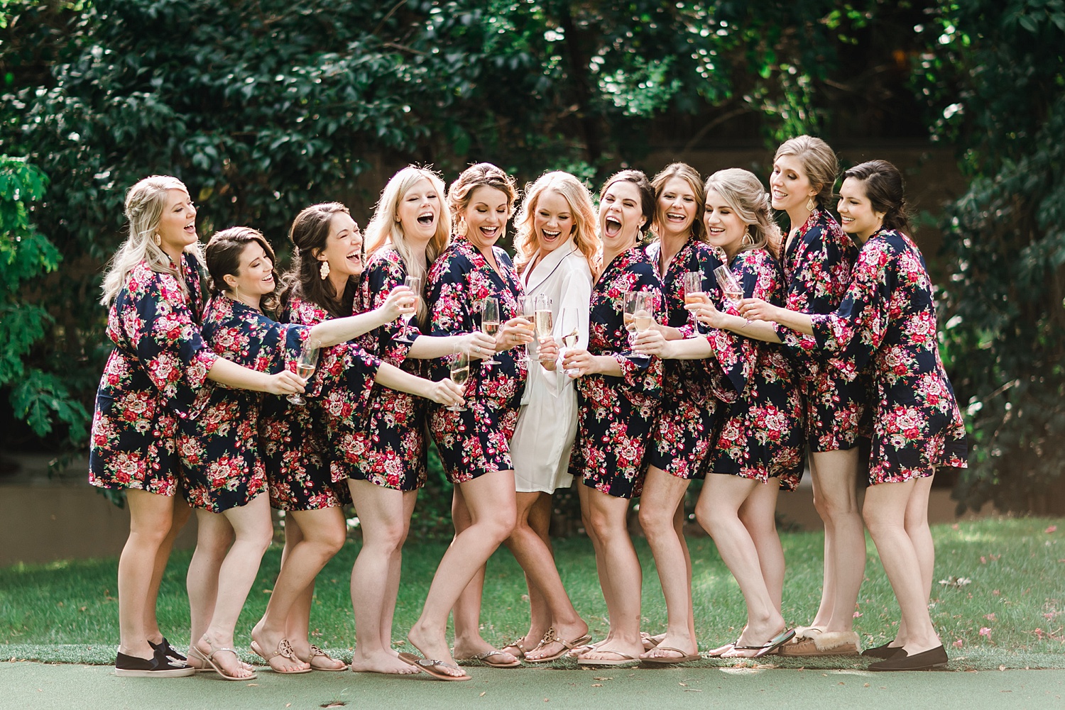 Bride and Bridesmaids group picture before Houstonian wedding