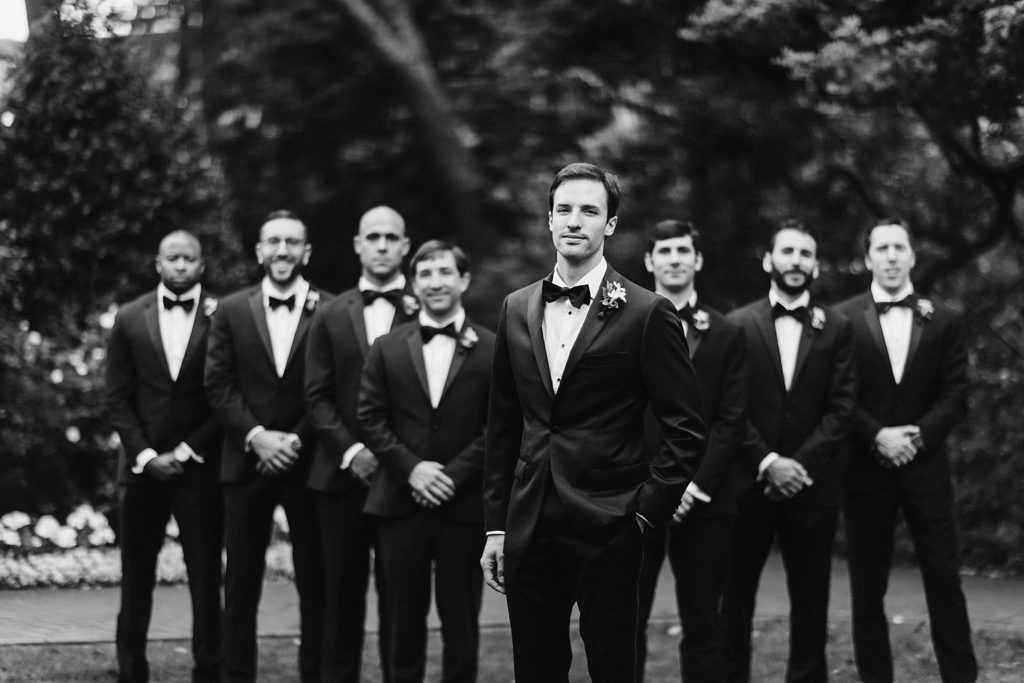 Groom and Groomsmen group picture in their suits before the wedding