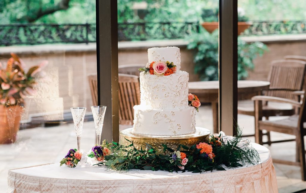 Elegant cake with swirls and flowers at the Houstonian 