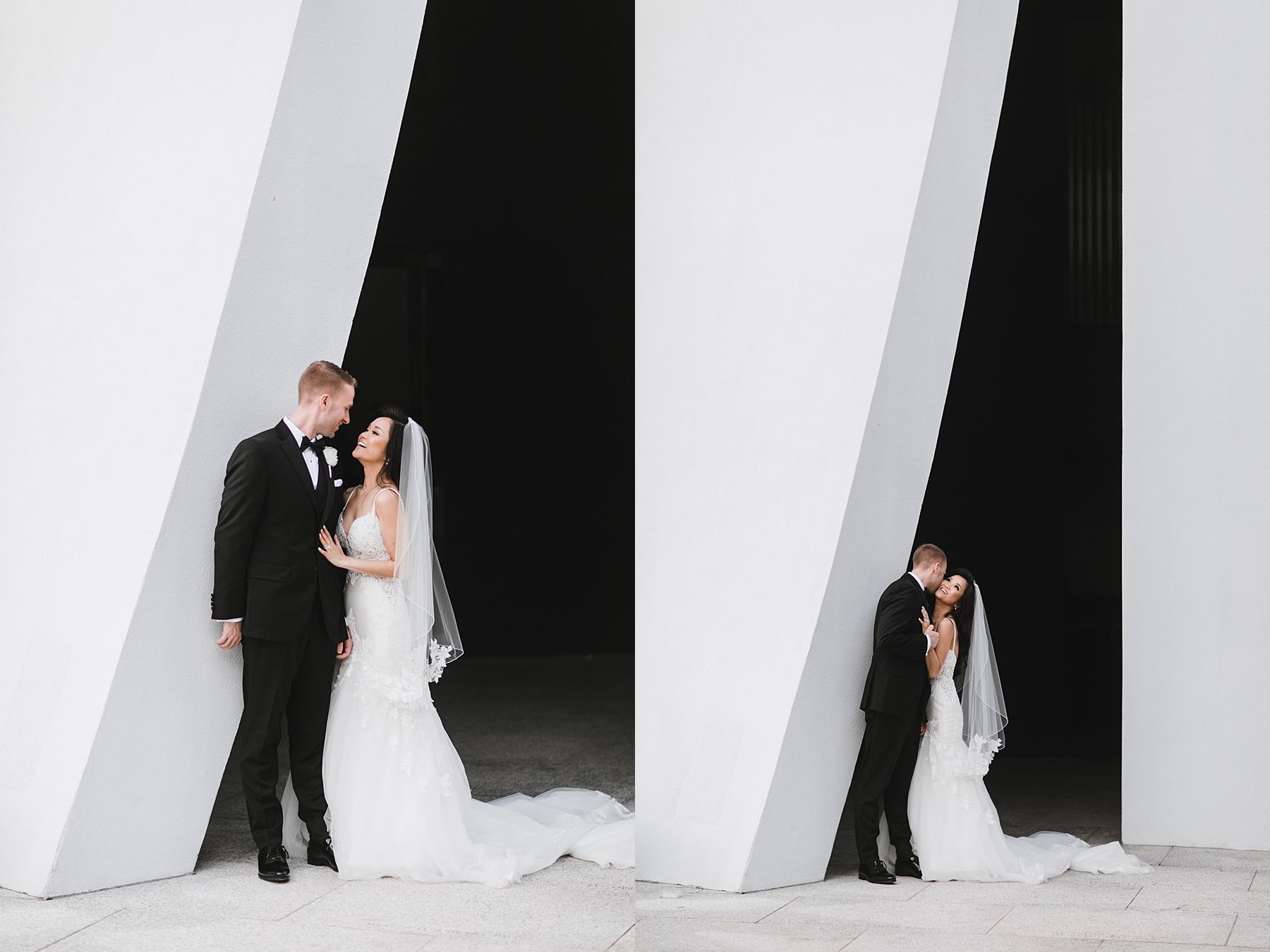 The newlyweds pose in front of black and white aesthetic wall in Houston