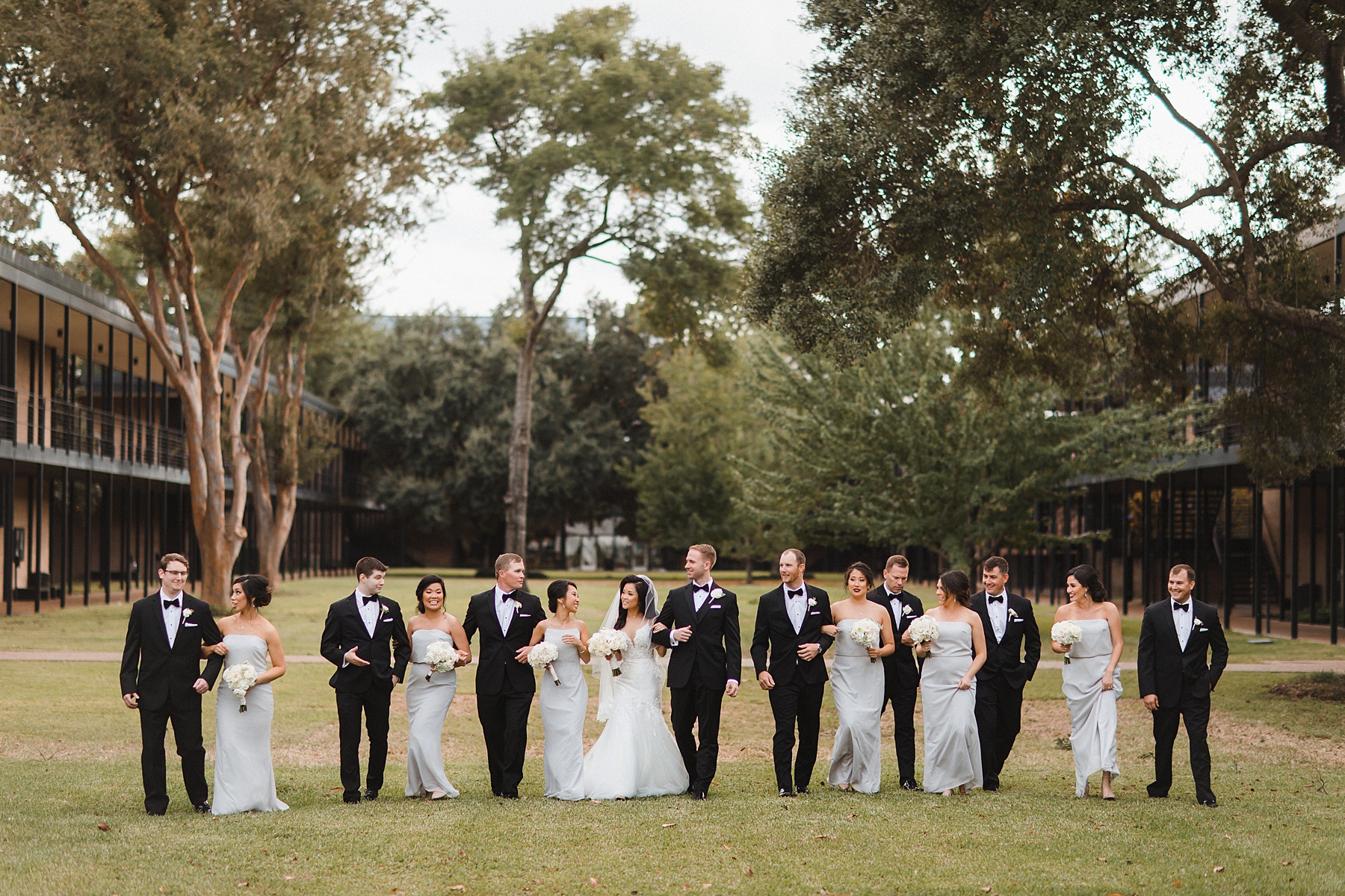 Group picture of the entire bridal party after the wedding ceremony 