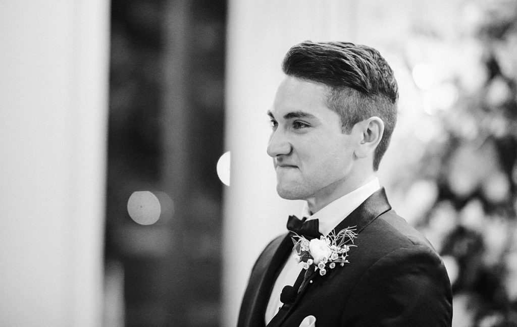Houston photographer captures groom at the alter at his glamorous wedding at ZaZa Hotel, Houston.
