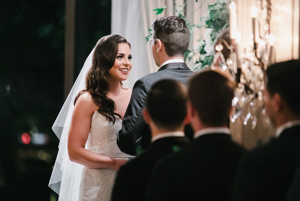 Houston photographer captures couple at the alter during their Houston wedding.